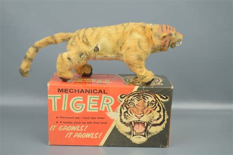 wind up metal tiger toy with fabric|Vintage Marx Wind.